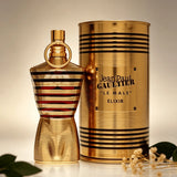 Jean Paul Gaultier Le Male Elixir EDP 125ML Perfume For Men Warm Vanilla Cardamom Woody Aroma Long Lasting Shiny Gold Metallic Striped Body Bottle With Gold Ring Cap Complete Gold Tin Box Dating Anniversary Present
