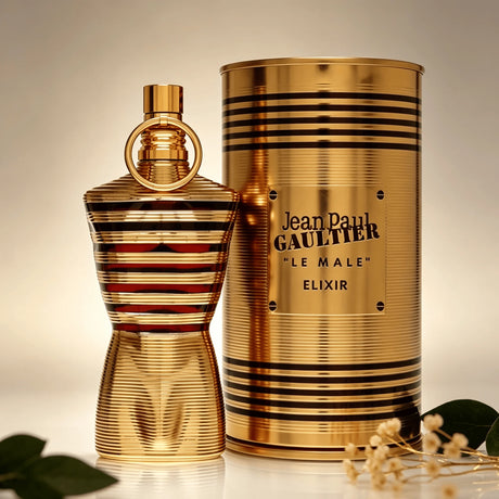 Jean Paul Gaultier Le Male Elixir EDP 125ML Perfume For Men Warm Vanilla Cardamom Woody Aroma Long Lasting Shiny Gold Metallic Striped Body Bottle With Gold Ring Cap Complete Gold Tin Box Dating Anniversary Present